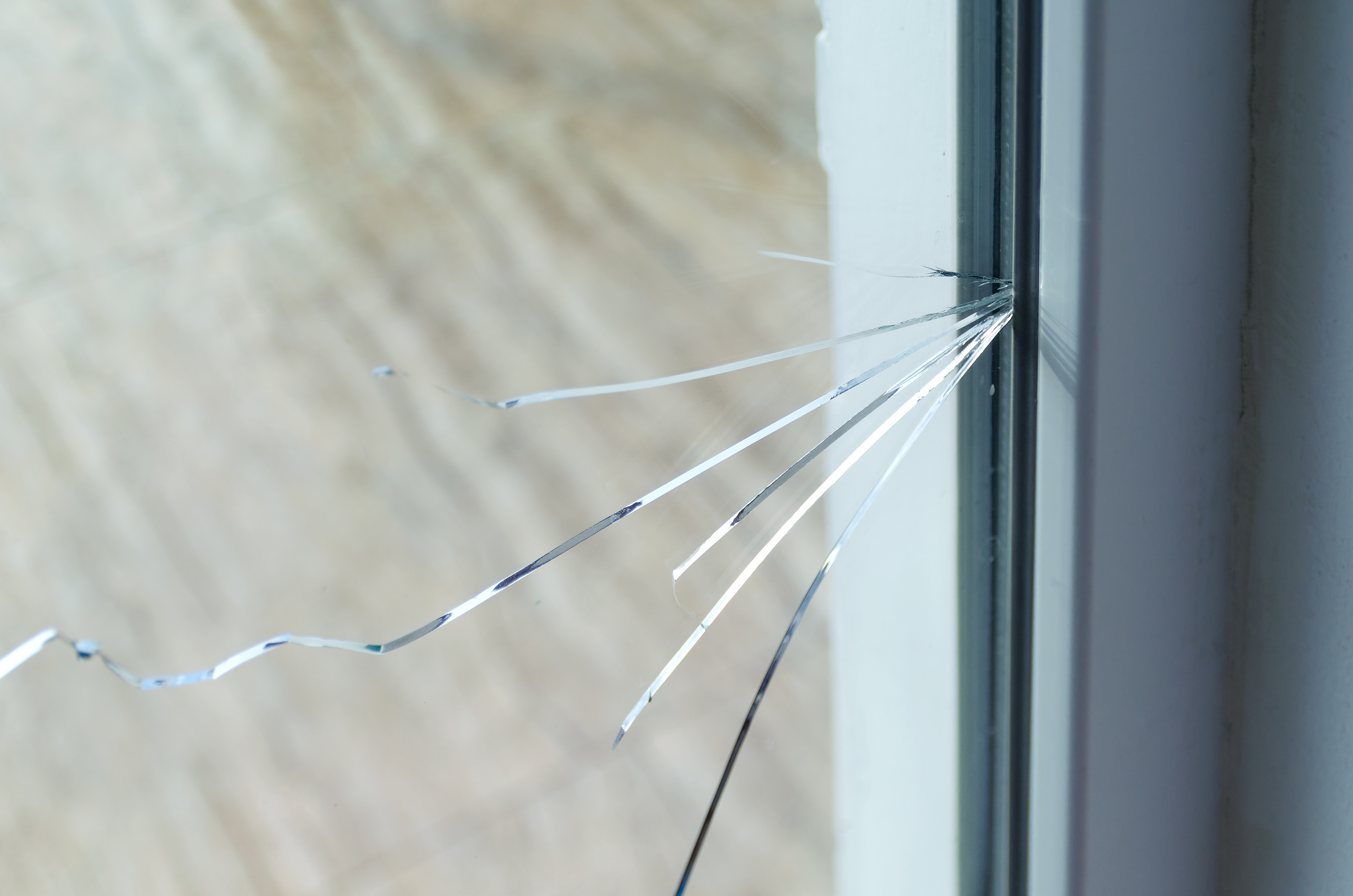 Crack,On,The,Glass,At,A,Residential,House.,Plastic,Window